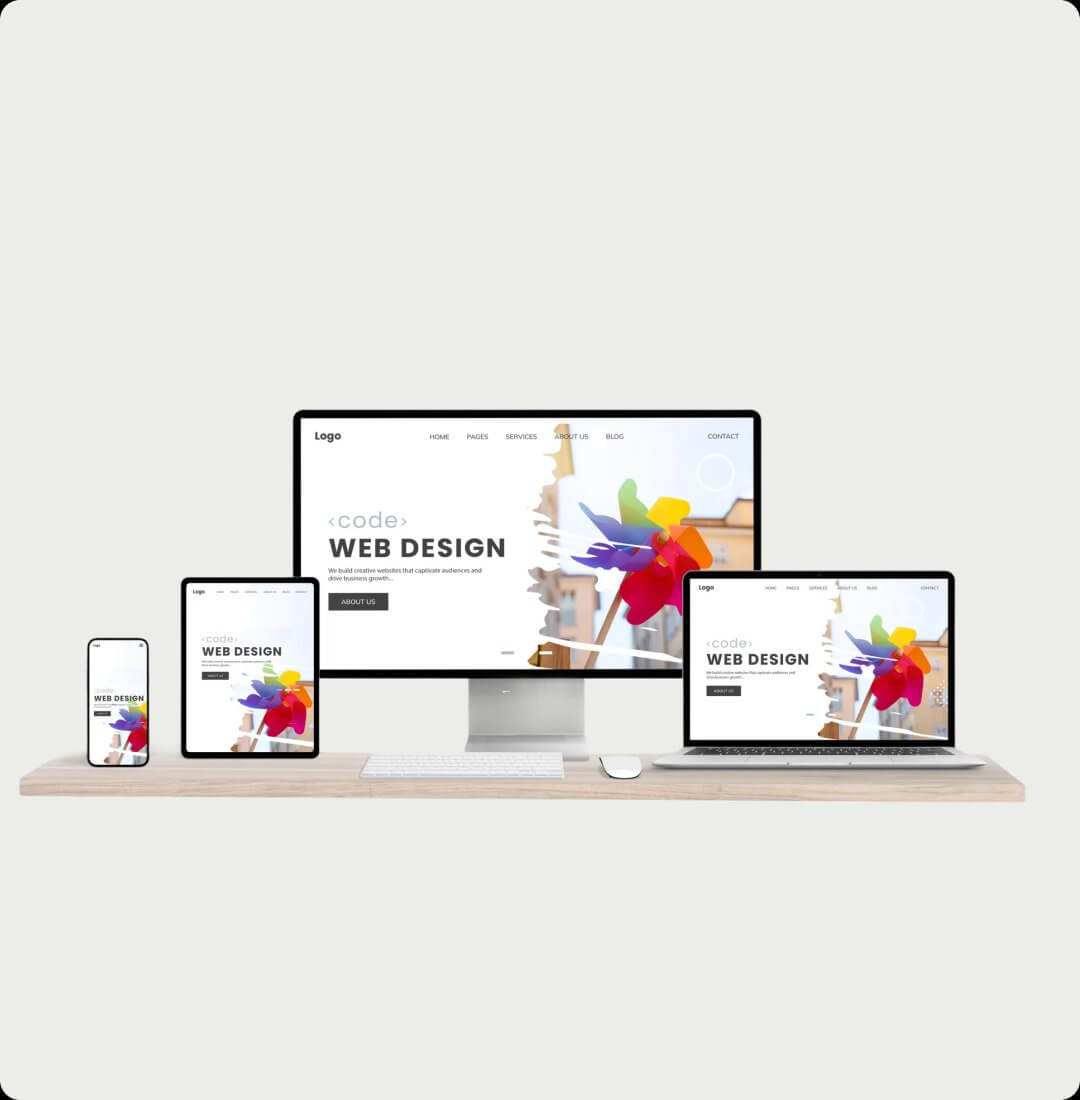 Multiple devices showing responsive web design across desktop, laptop, tablet and mobile